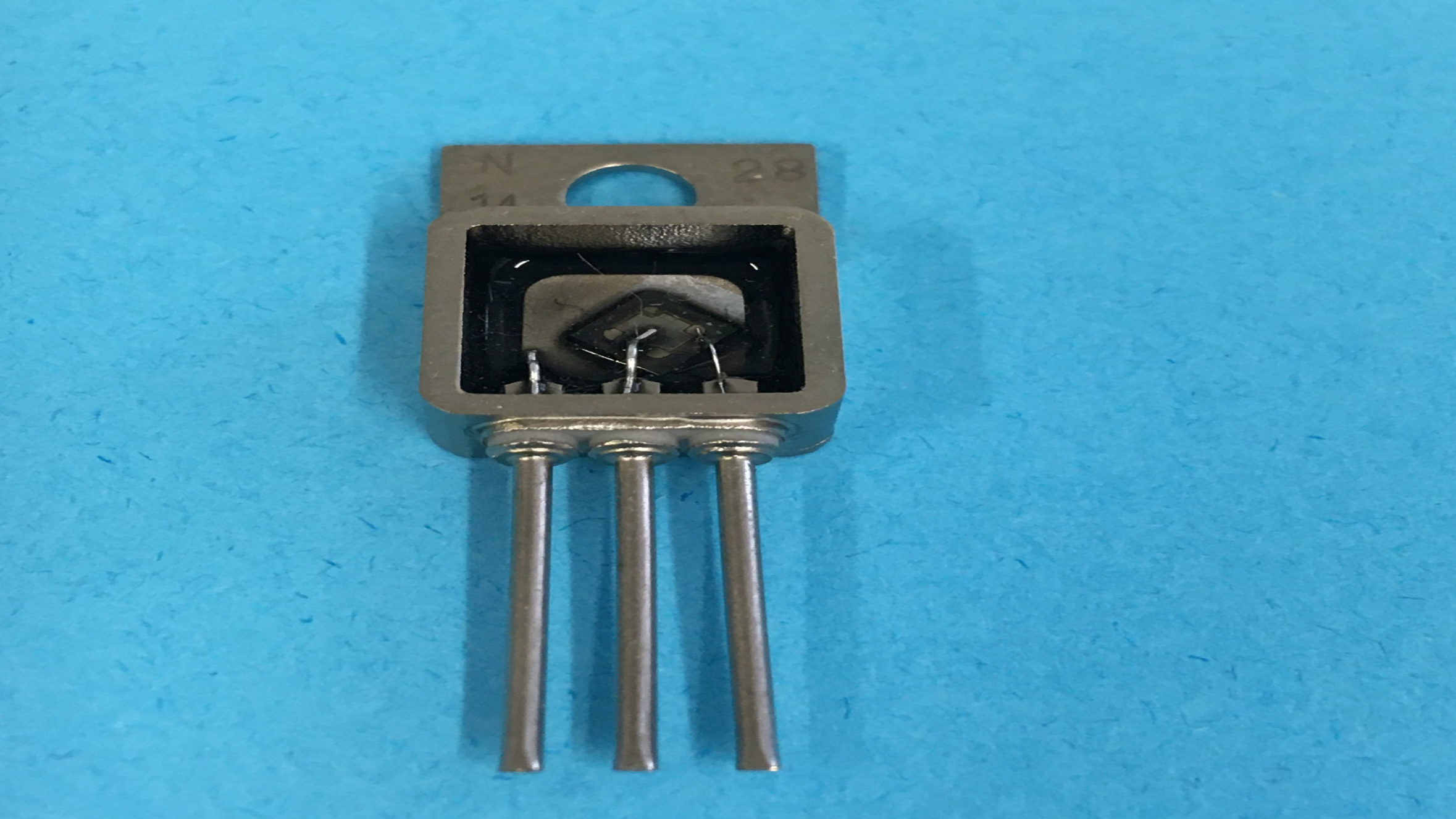 Silicon Carbide Bandgap Reference Using Hybrid Construction Techniques for Operation Over -100 degC to 250 degC and 1Mrad TID