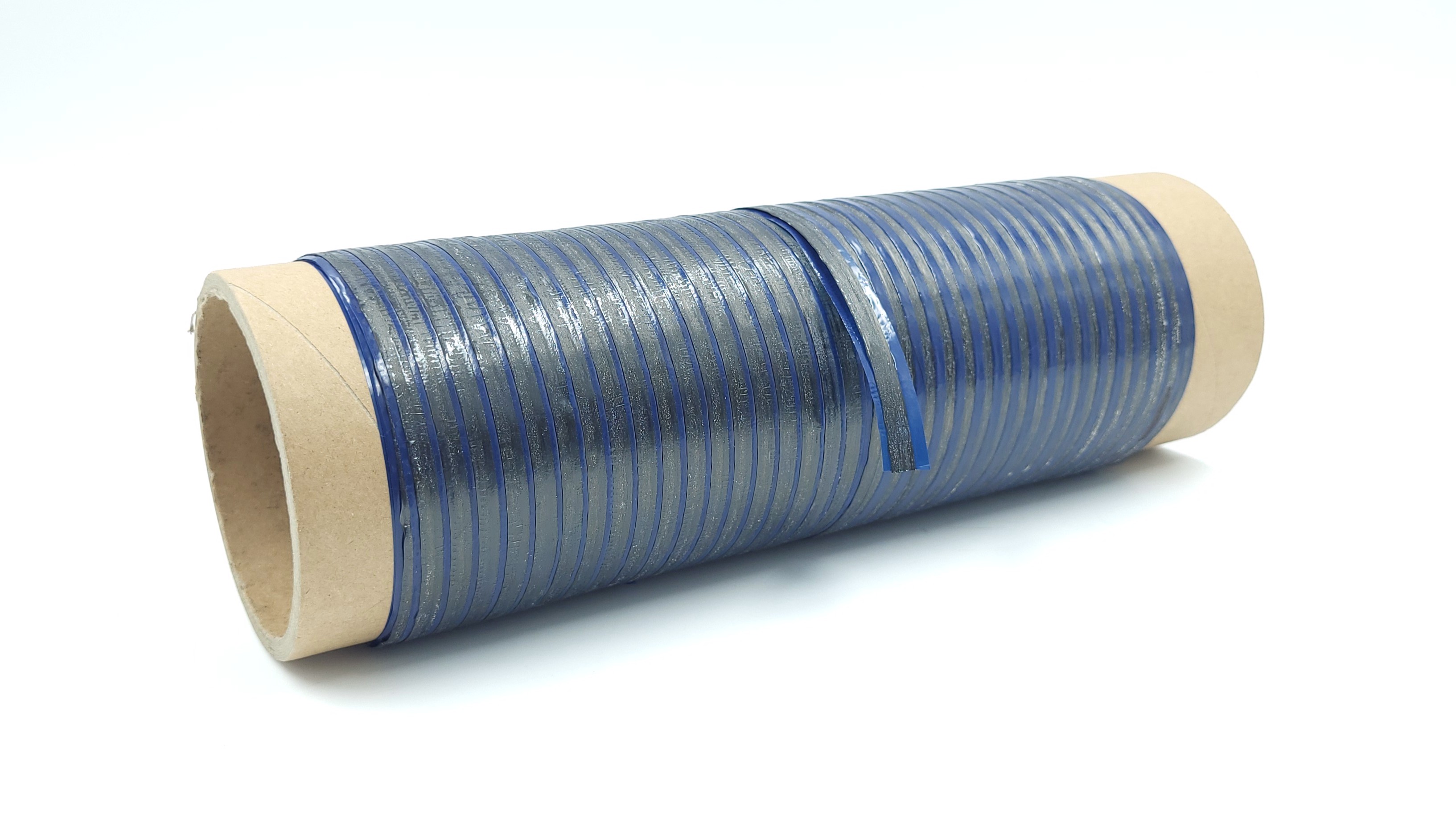 A slit-tape bobbin from the industrialization stage, as used for AFP compatibility testing.